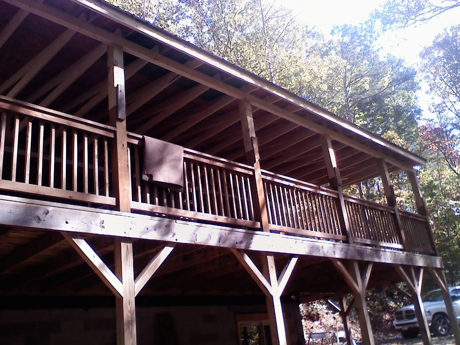 Timber framing under a new elevated porch and deck — Roof Leak Repair in Camdenton by Roofing Brothers